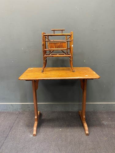 Lot 810 - A 20th century oak centre table with canted...