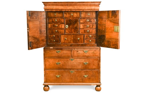 Lot 348A - A William & Mary walnut feather banded cabinet on chest, late 17th century