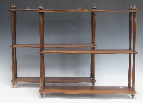 Lot 281 - A near pair of mahogany hanging wall shelves,...