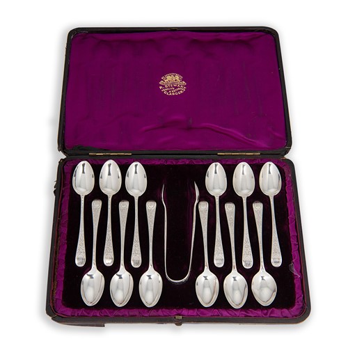 Lot 357 - Glasgow - A cased set of 12 Victorian silver teaspoons with tongs