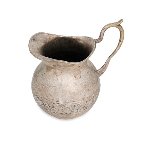 Lot 283 - A German metalwares silver water jug