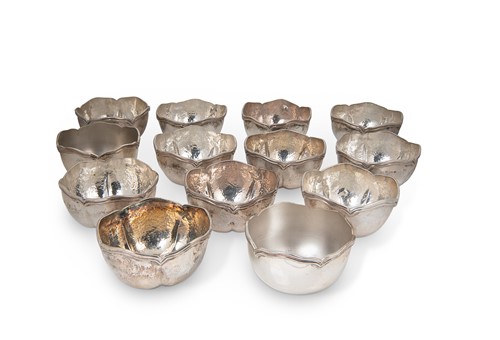 Lot 288 - A set of 11 Peruvian metalwares silver ice cream bowls with two additions