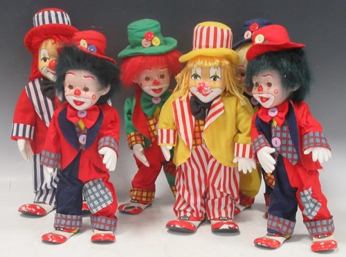 Lot 149 - A group of six clown dolls with porcelain...