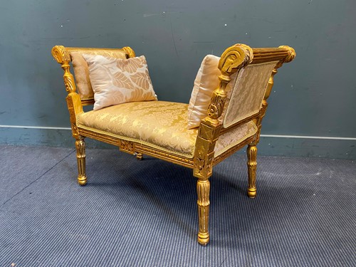 Lot 379 - A George III style giltwood window seat, the...