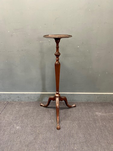 Lot 377 - A George III style mahogany torchere stand,...