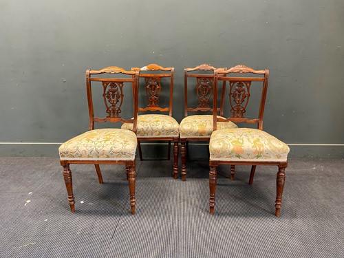 Lot 384 - Four mahogany carved back dining chairs with...