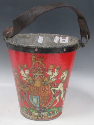 Lot 315 - A red painted fire bucket with leather handle...
