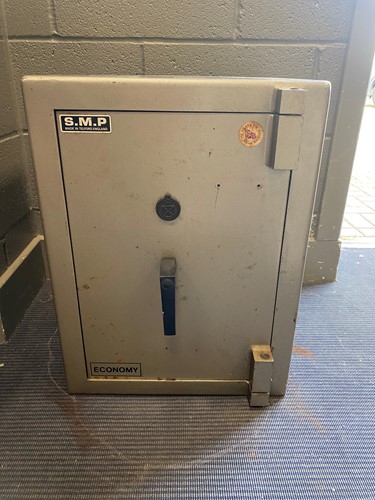 Lot 304 - A Steel safe "S.M.P" made in Telford England,...