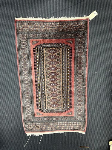 Lot 853 - A Bokhara rug, signed within the border 166 x...