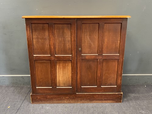 Lot 746 - Varnished pine cabinet with brass sunk handle...