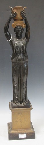 Lot 47 - A Regency style bronzed figural lamp, modelled...