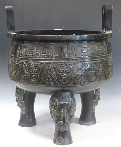 Lot 163 - A chinese bronze ding tripod censer, in...