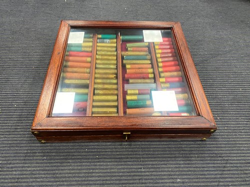 Lot 143 - An oak cased collection of cartridges, within...