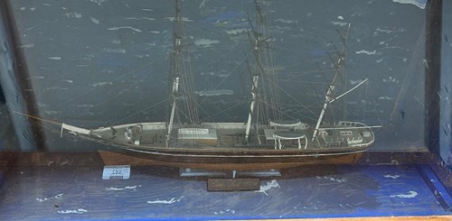 Lot 844 - A cased model of the Cutty Sark. 36cm High x...