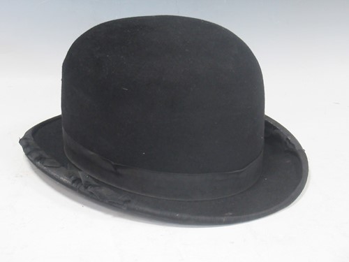 Lot 324 - A bowler hat, by Moores & Sons of London
