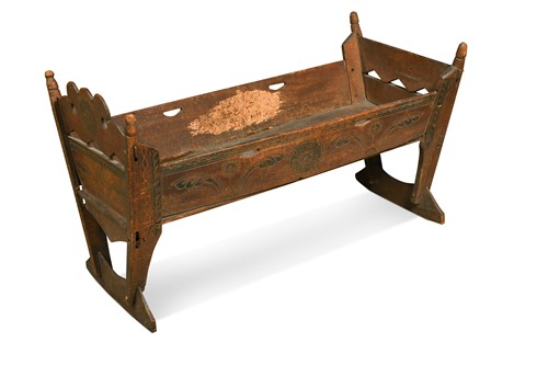 Lot 657 - A folk art wooden cradle, 18th century