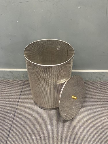 Lot 302 - A Chrome cylindrical laundry basket with gold...