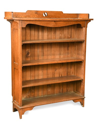 Lot 650 - A Liberty style Arts & Crafts oak open bookcase