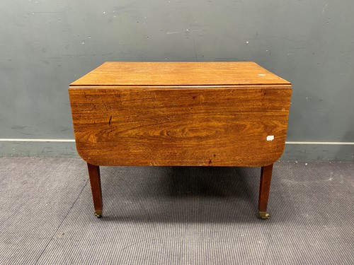 Lot 661 - A mahogany drop leaf sofa table with one...