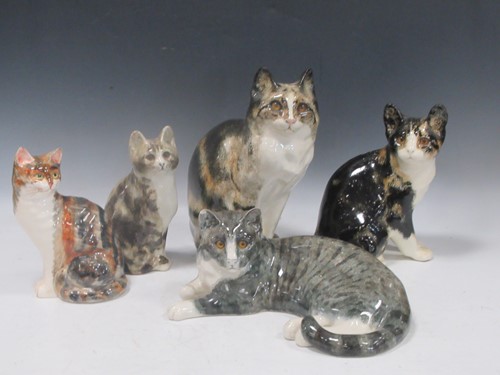 Lot 117 - A group of three Winstanley pottery cats,...