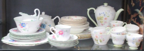 Lot 105 - Pretty floral part tea services, Plant Tuscan...