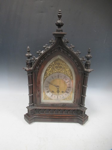 Lot 64 - A late Victorian ebonised striking mantel...