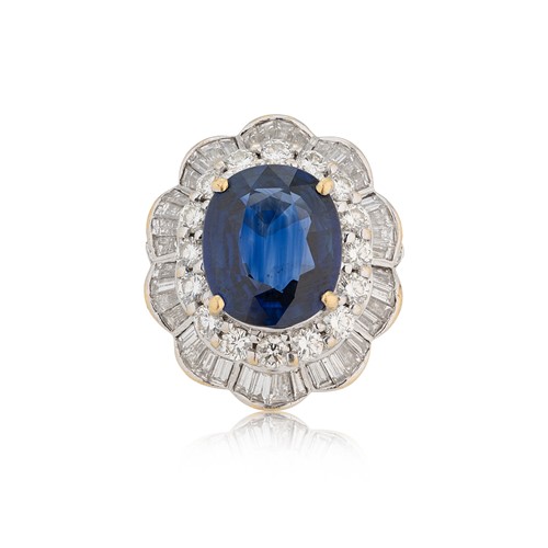 Lot 151 - A modern sapphire and diamond cluster ring