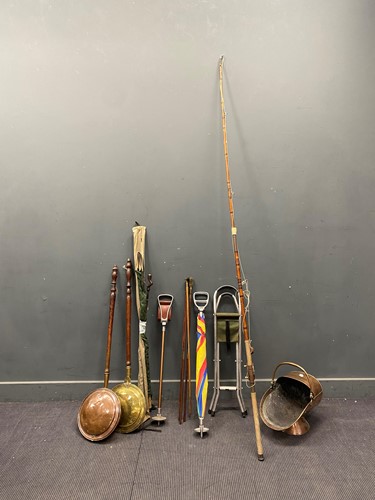 Lot 300 - A vintage fishing rod, two shooting sticks,...