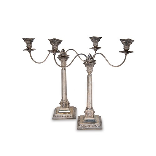 Lot 331 - A pair of George V silver candlesticks with later additions