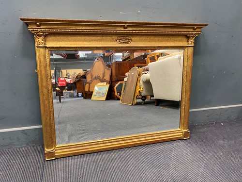Lot 739 - A regency style wall mirror with fluted...