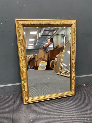 Lot 737 - A floral painted rectangular wall mirror, 89cm...