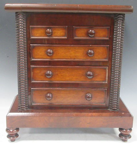 Lot 291 - A 19th century miniature mahogany chest of...