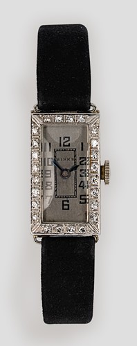 Lot 199 - Unsigned, retailed by Birks - A Canadian metalwares diamond set cocktail watch
