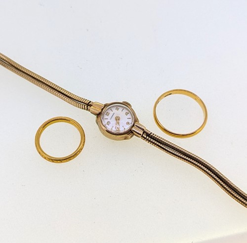 Lot 405 - Two hallmarked 22ct gold wedding bands, gross...