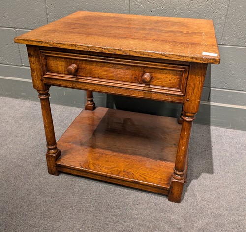Lot 616 - A modern oak rectangular coffee table with six...
