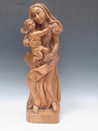 Lot 49 - A 20th century Continental carved wood figure...