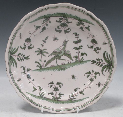 Lot 195 - A French Moustiers green and white faience plate, 18th century