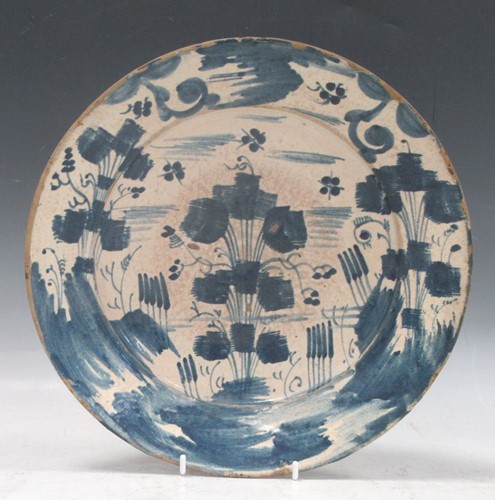Lot 196 - 18th century Spanish earthenware dish with...