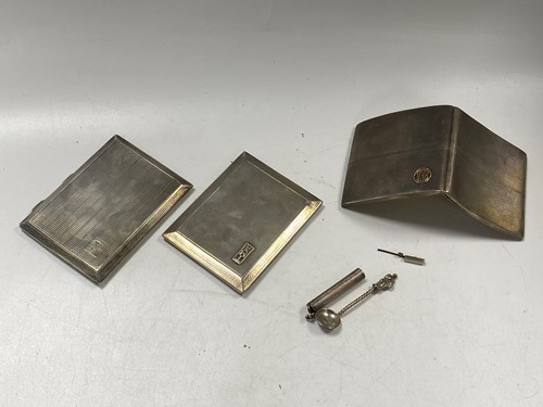 Lot 381 - Three silver cigarette cases together with a...