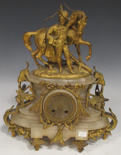 Lot 203 - A brass and alabaster mantel clock with horse,...