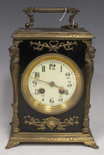 Lot 202 - A French black and gilt carriage clock with...
