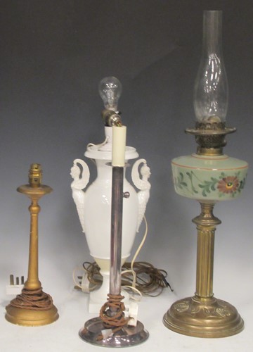 Lot 177 - A painted glass and brass paraffin lamp 71cm H,...