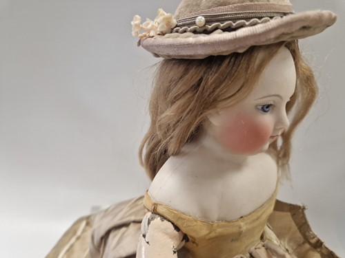 Lot 50 - An Adelaide Huret bisque shoulder head fashion doll with accessories