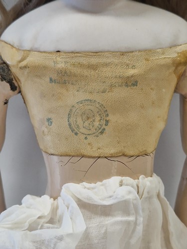 Lot 50 - An Adelaide Huret bisque shoulder head fashion doll with accessories