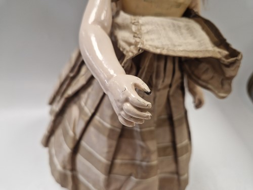 Lot 50 - An Adelaide Huret bisque shoulder head fashion doll with accessories