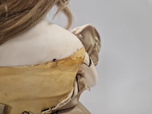Lot 50 - An Adelaide Huret bisque shoulder head fashion doll with accessories