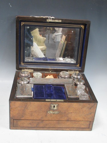 Lot 122 - A Victorian walnut dressing table box with...