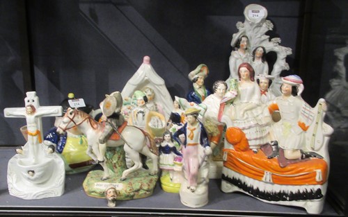 Lot 214 - Mid 19th century Staffordshire figures to...