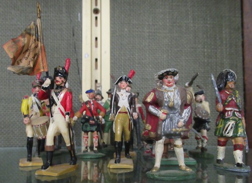 Lot 321 - A group of Britains and other painted model...