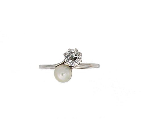 Lot 88 - A pearl and diamond crossover ring